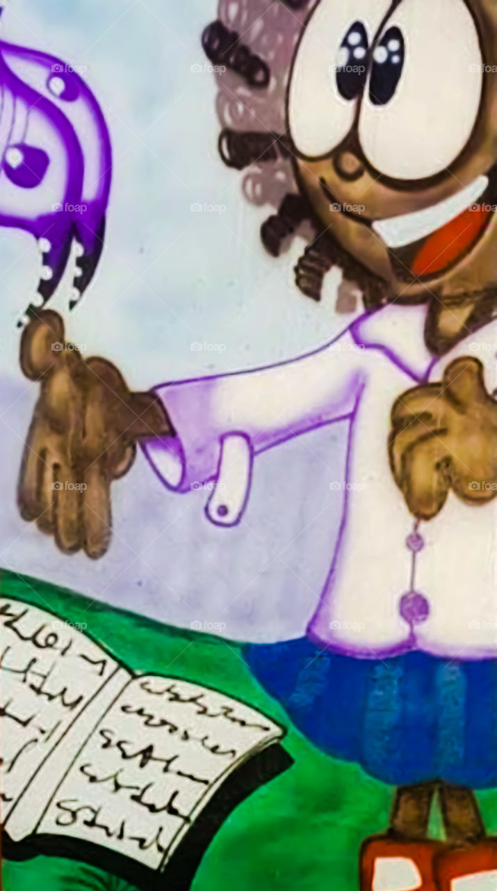 Colorful and educational art mural in school.
Mural de arte colorido e educativo em escola