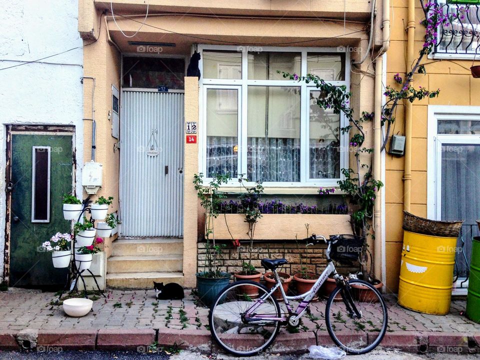 Bicycle in cosy yard of Brugge