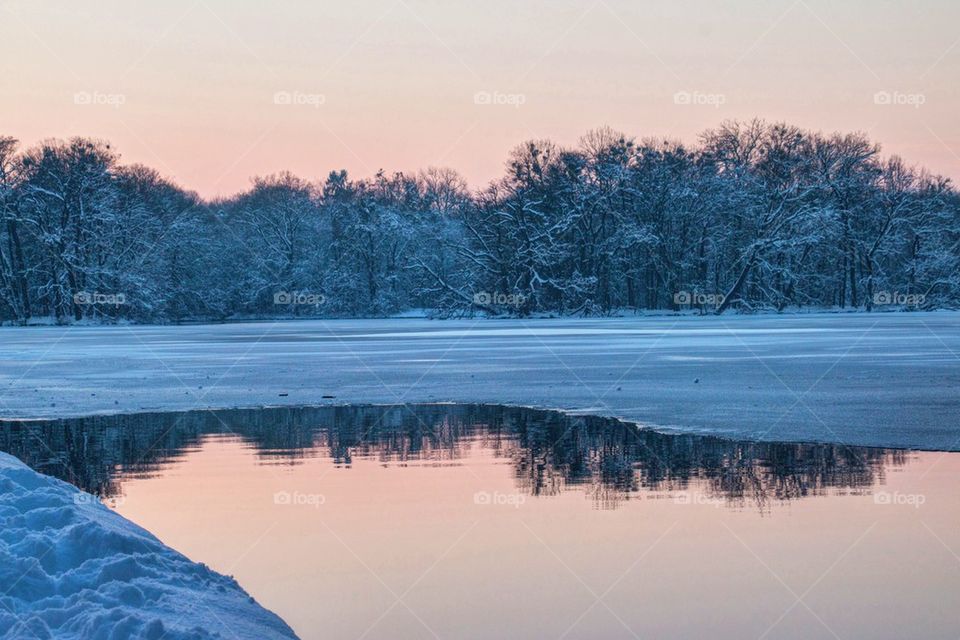 Frozen lake at sunset