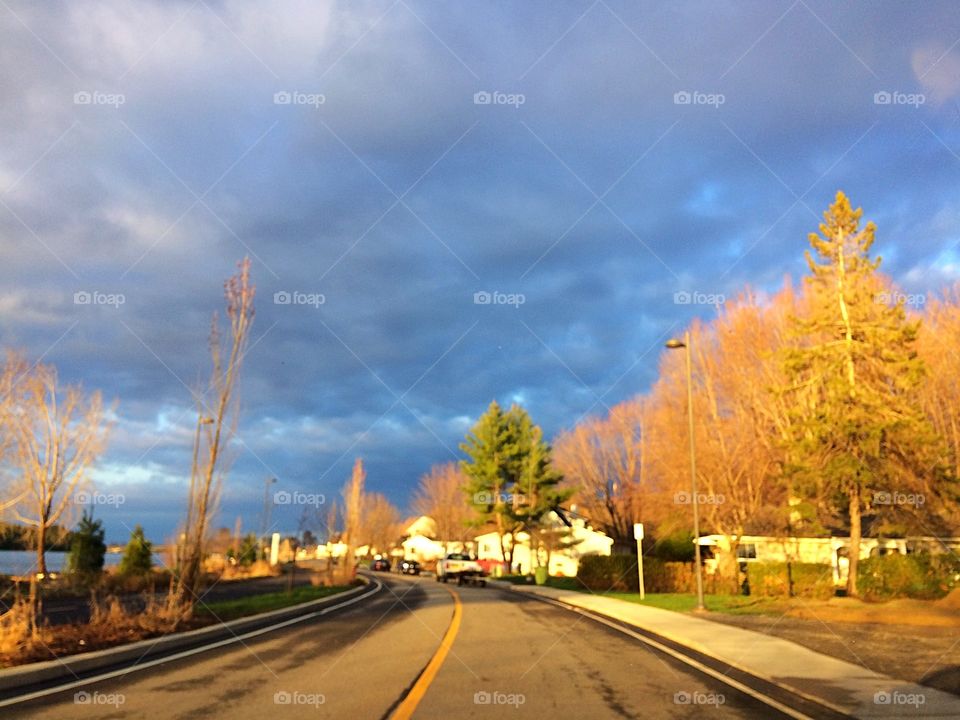 Sun coming out through cloudy sky