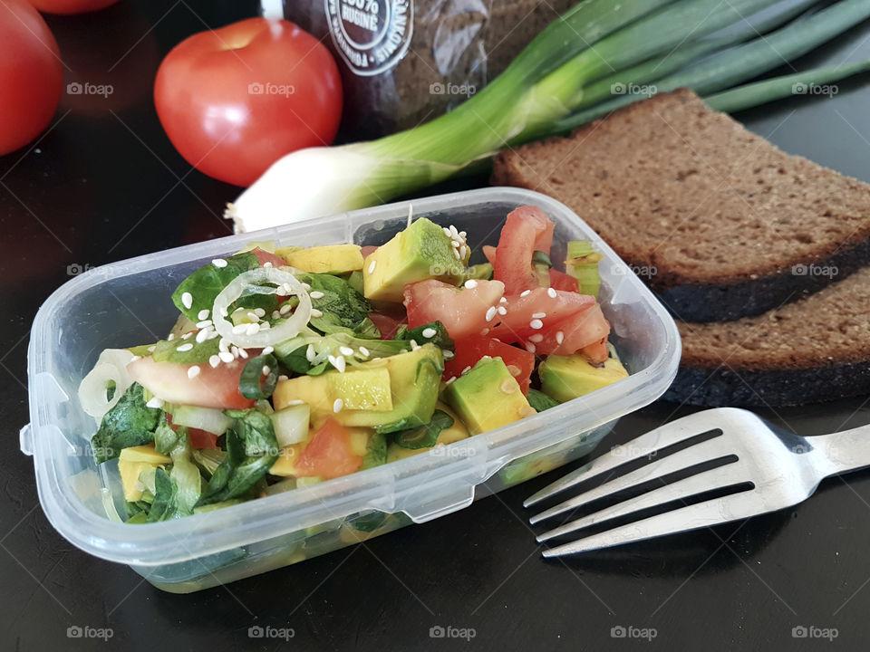 Lunchbox with homemade healthy salad at work and school