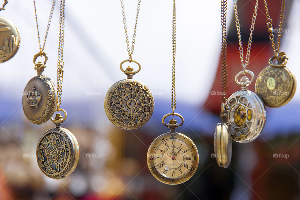 Classic antique pocket watches at the market