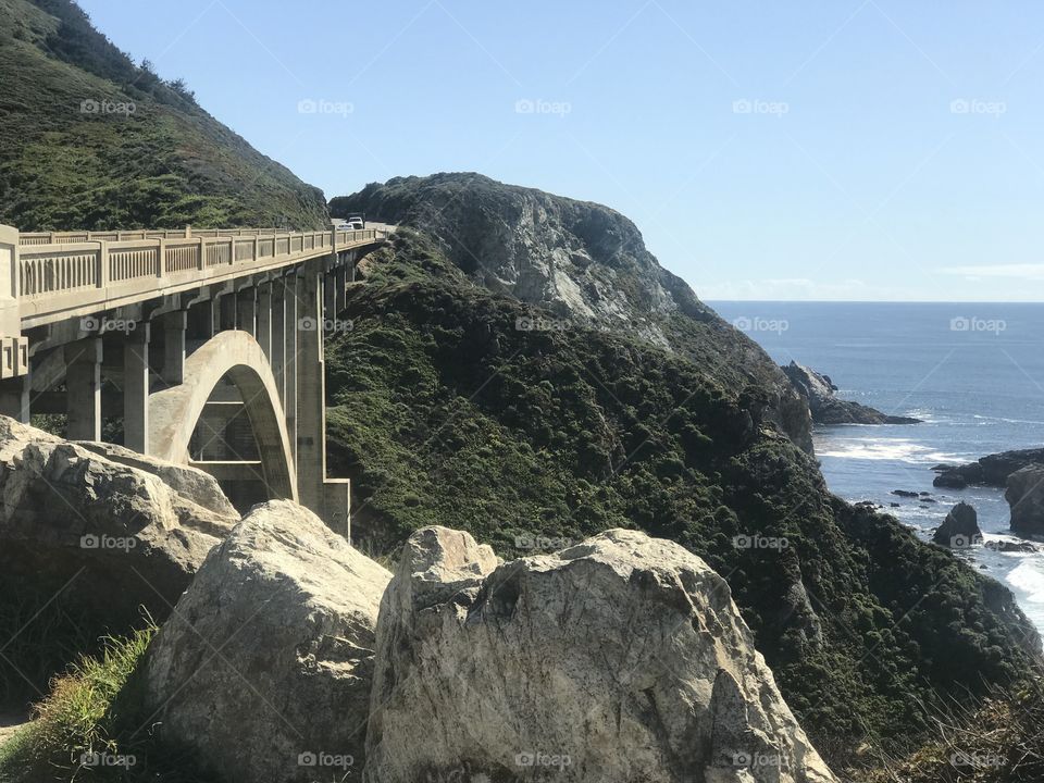 Approaching a bridge that almost hides in plain view among the coastal nature surrounding it. A connection between architectural design and Mother Nature.