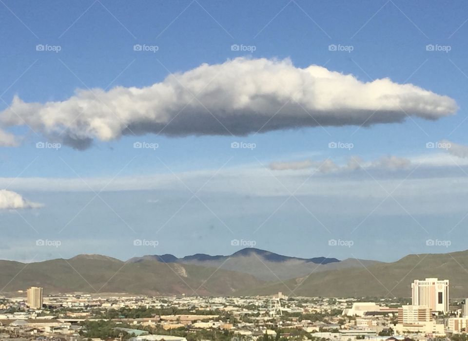 a cloud floating above reno, nv