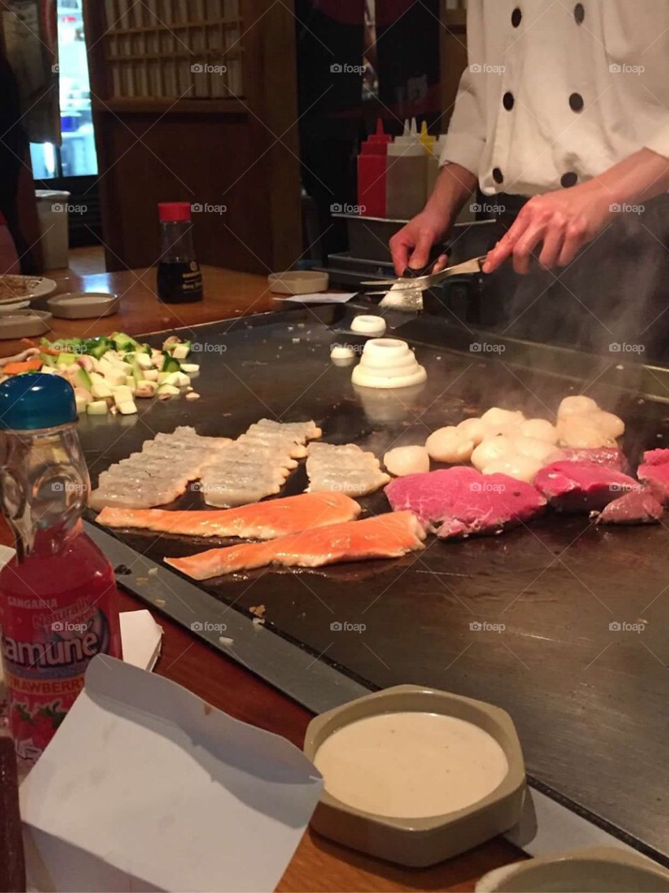 Hibachi chef preparing food. 