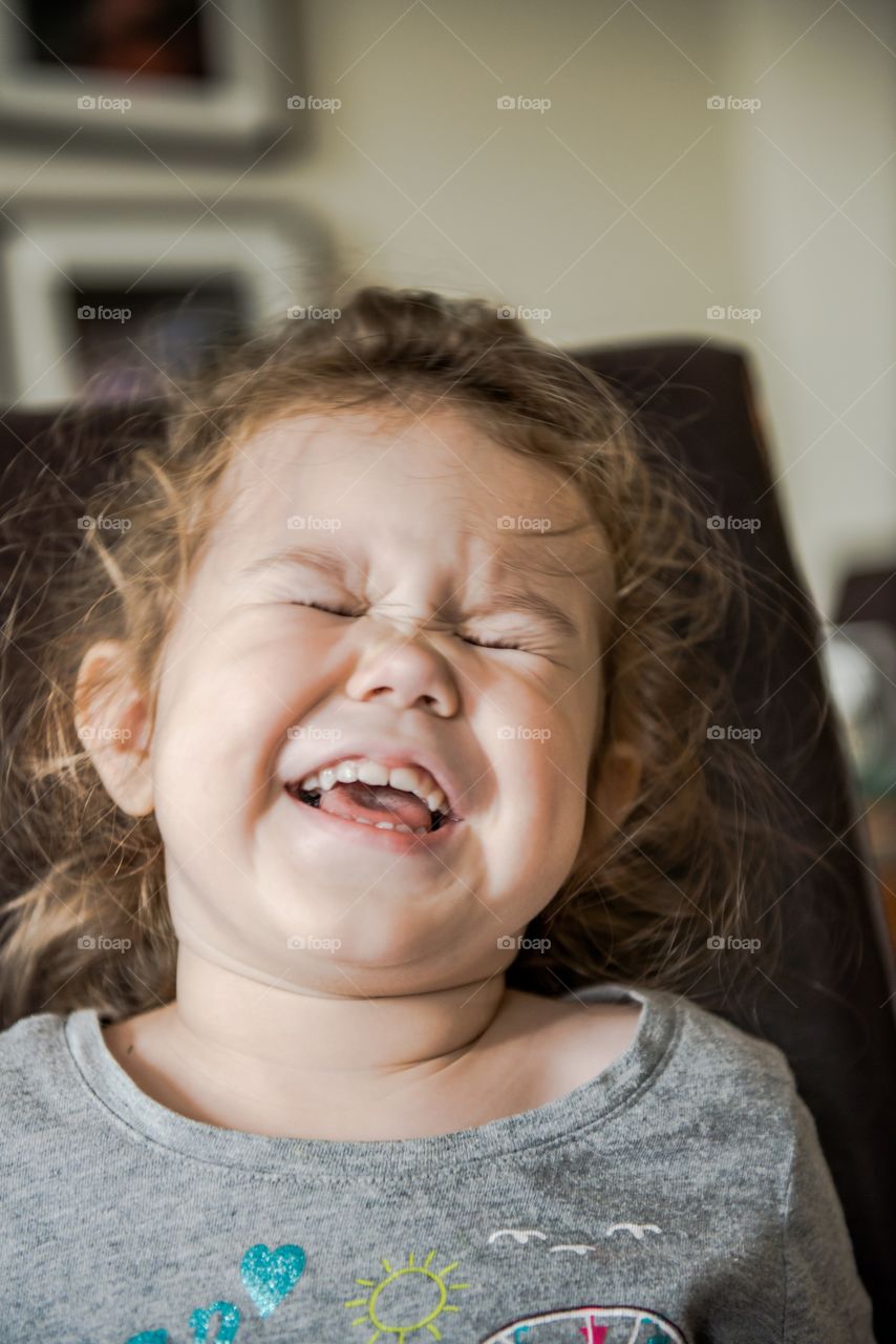 Crying girl with closed eyes