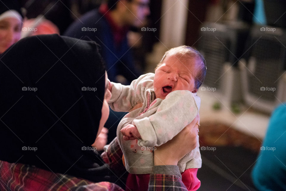 newborn moving her mouth searching for food