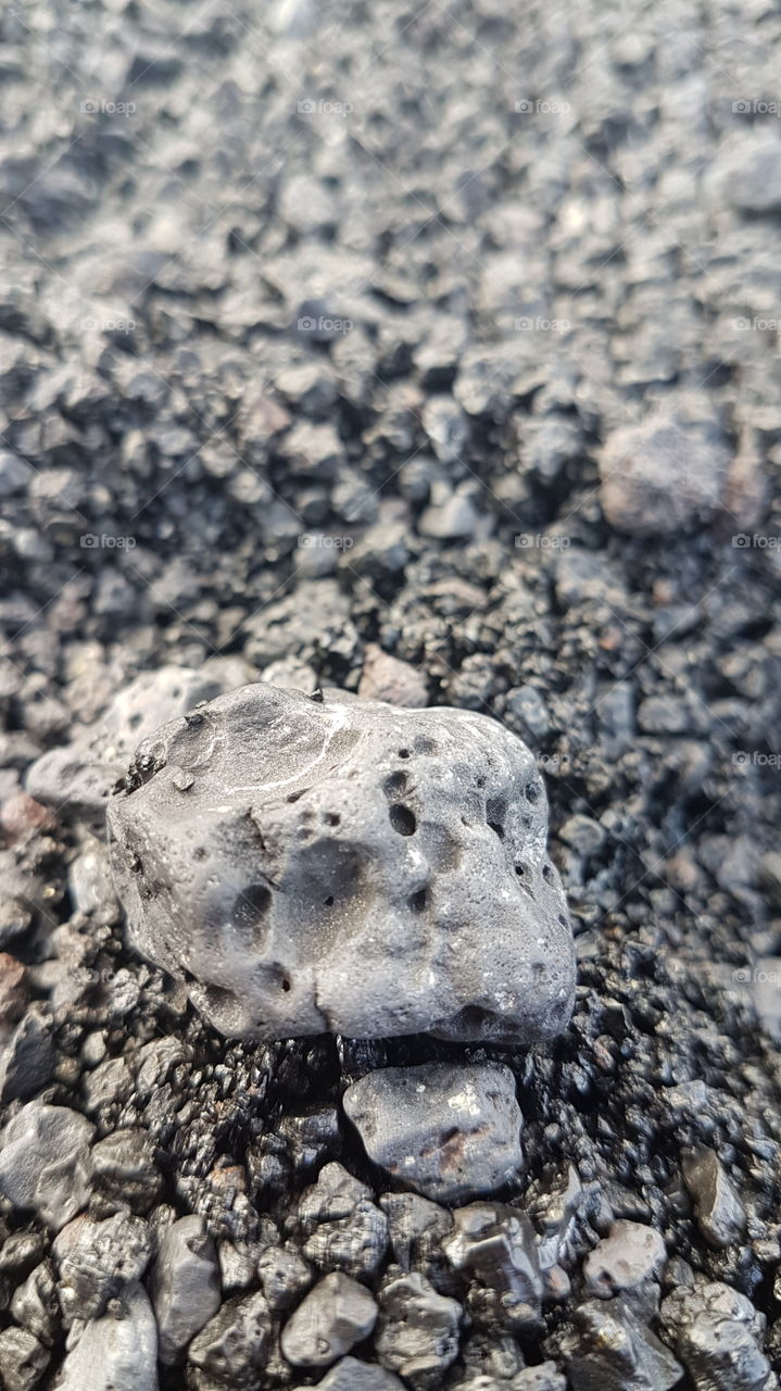 Close up of the beach sand that formed in the Puna region following the eruption of the volcano in 2018, Big Island, Hawai'i, USA