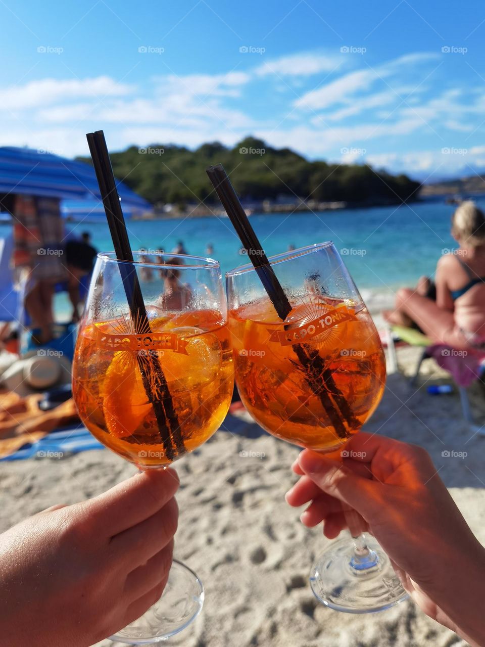 Cheers for us! Amazing beach day.