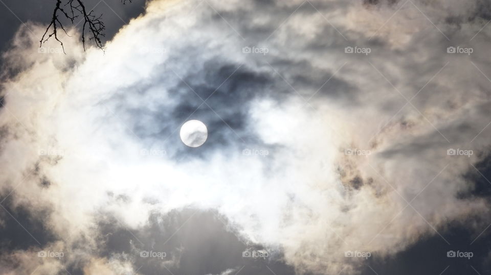 the beginning of a solar eclipse. sun