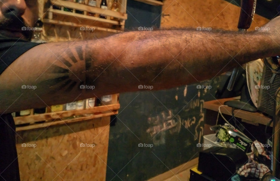 Arm tattoo