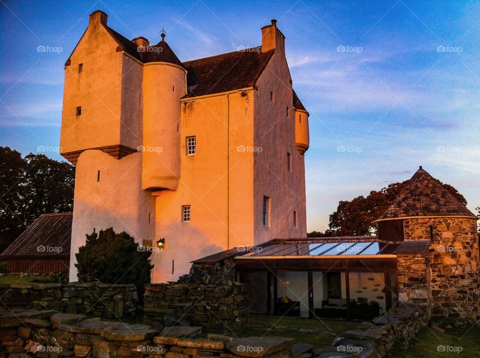 Remodel castle in Scotland At sunset