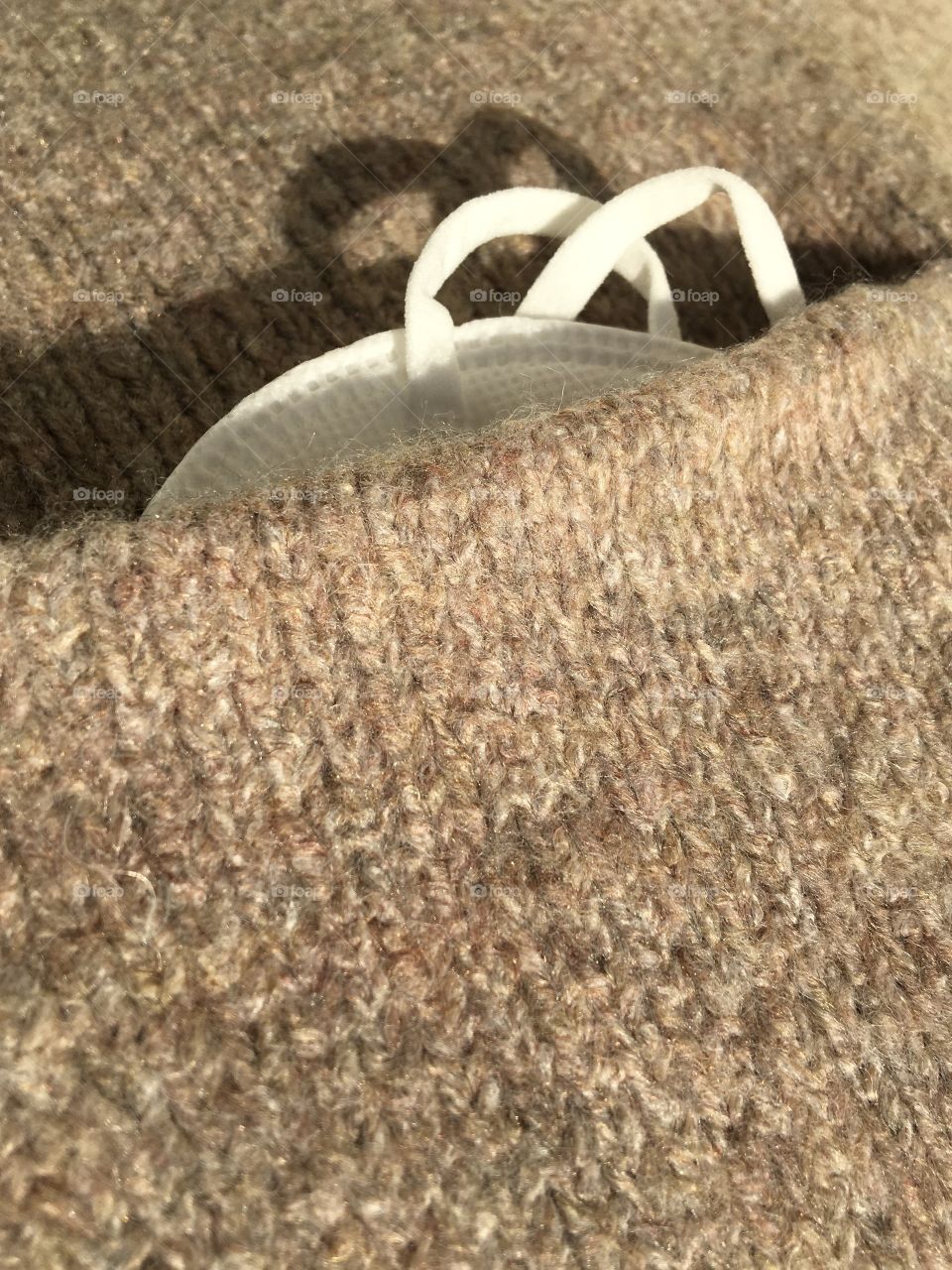 Wool coat with mask in the pocket