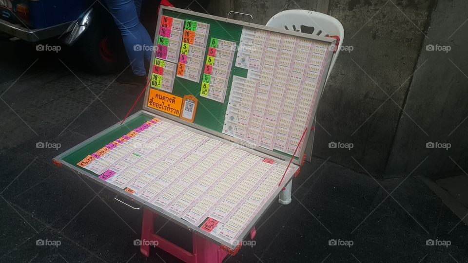 Thai lottery on stall selling on side street in bangkok ,thailand