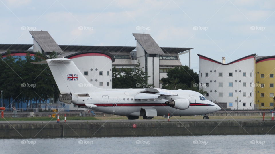 the queens avroliner landing  at London city airport