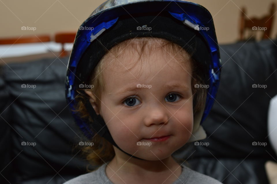 Child in a unique helmet