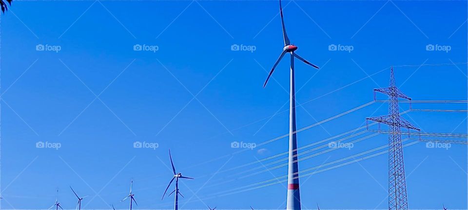 These wind turbines were found near “Stralsund”, a town in northern Germany in “Mecklenburg - Western Pomerania” by the “Strelasund”, a part of the “Baltic Sea”. Several bridges to the island of “Rügen” cross here. 2024. Hypnotic Productions