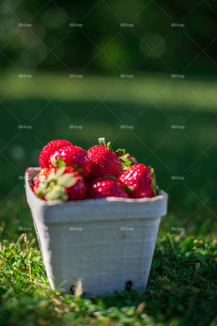 strawberries in a box.