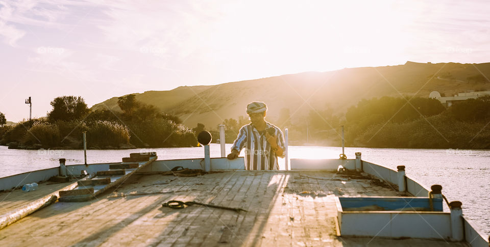 Sailing to see sunset over Nile river in Aswan , Egypt 