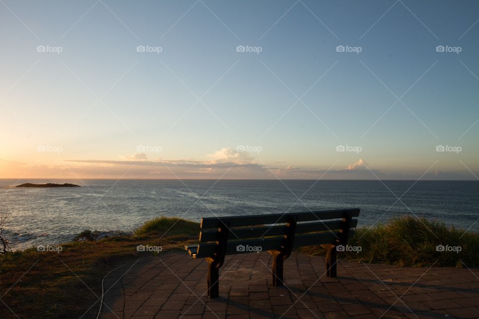 Chair at ocean Sunrise