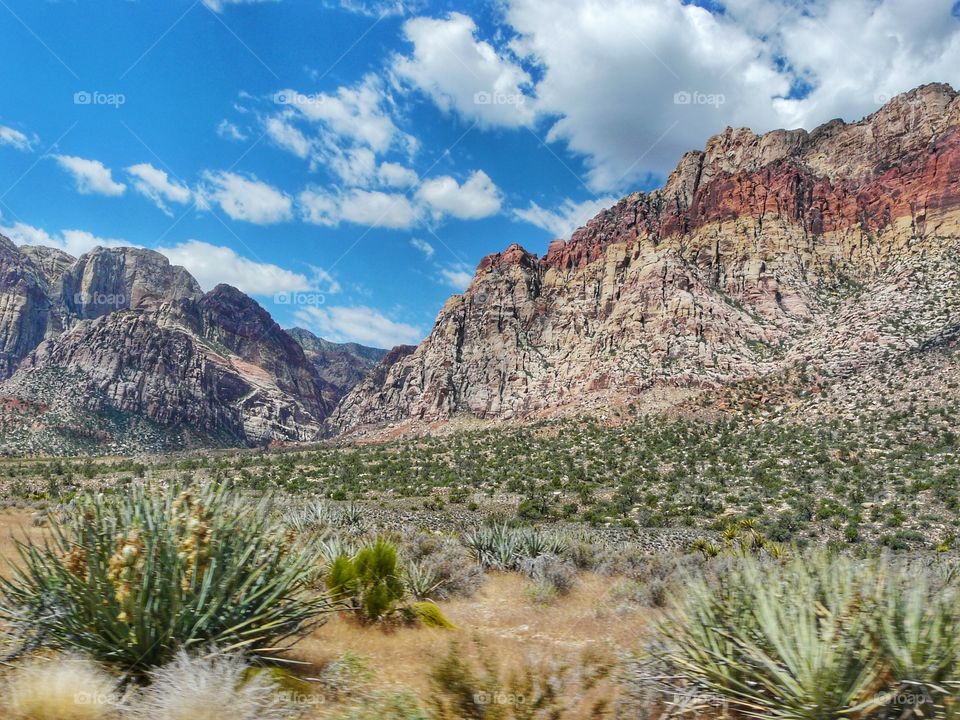 Mountains against cloudy sky