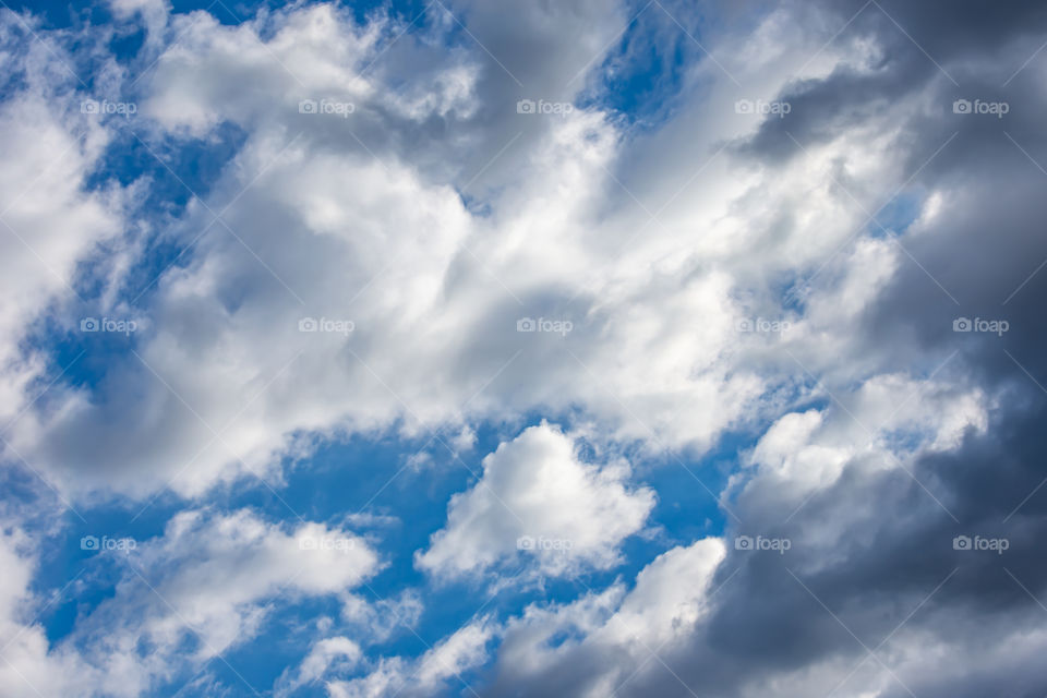 The beauty of the sky with clouds and the sun.