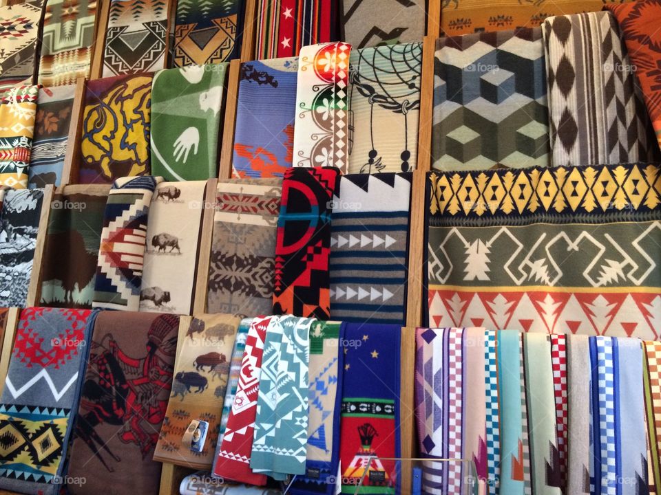 Handmade blankets with patterns, designs and colors on display 