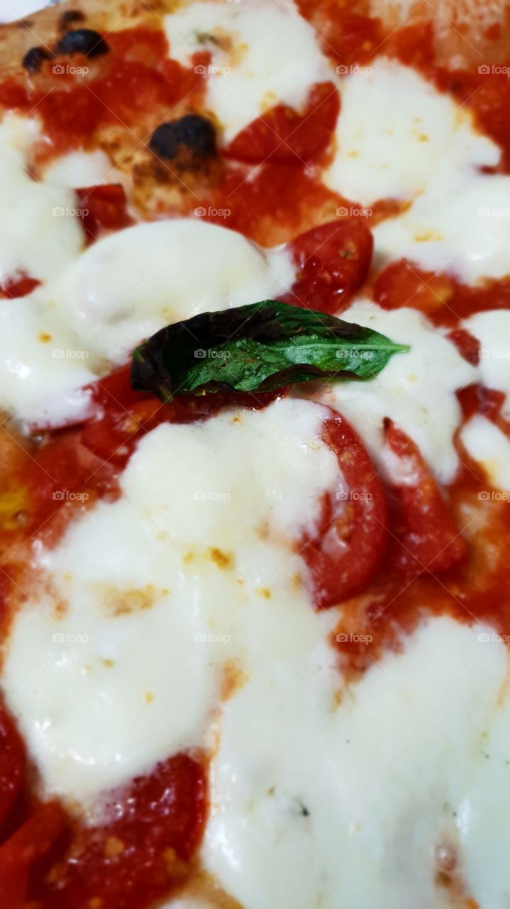 Real italian pizza in Naples, where the first pizza margherita was made...Napoli city.  pizzeria