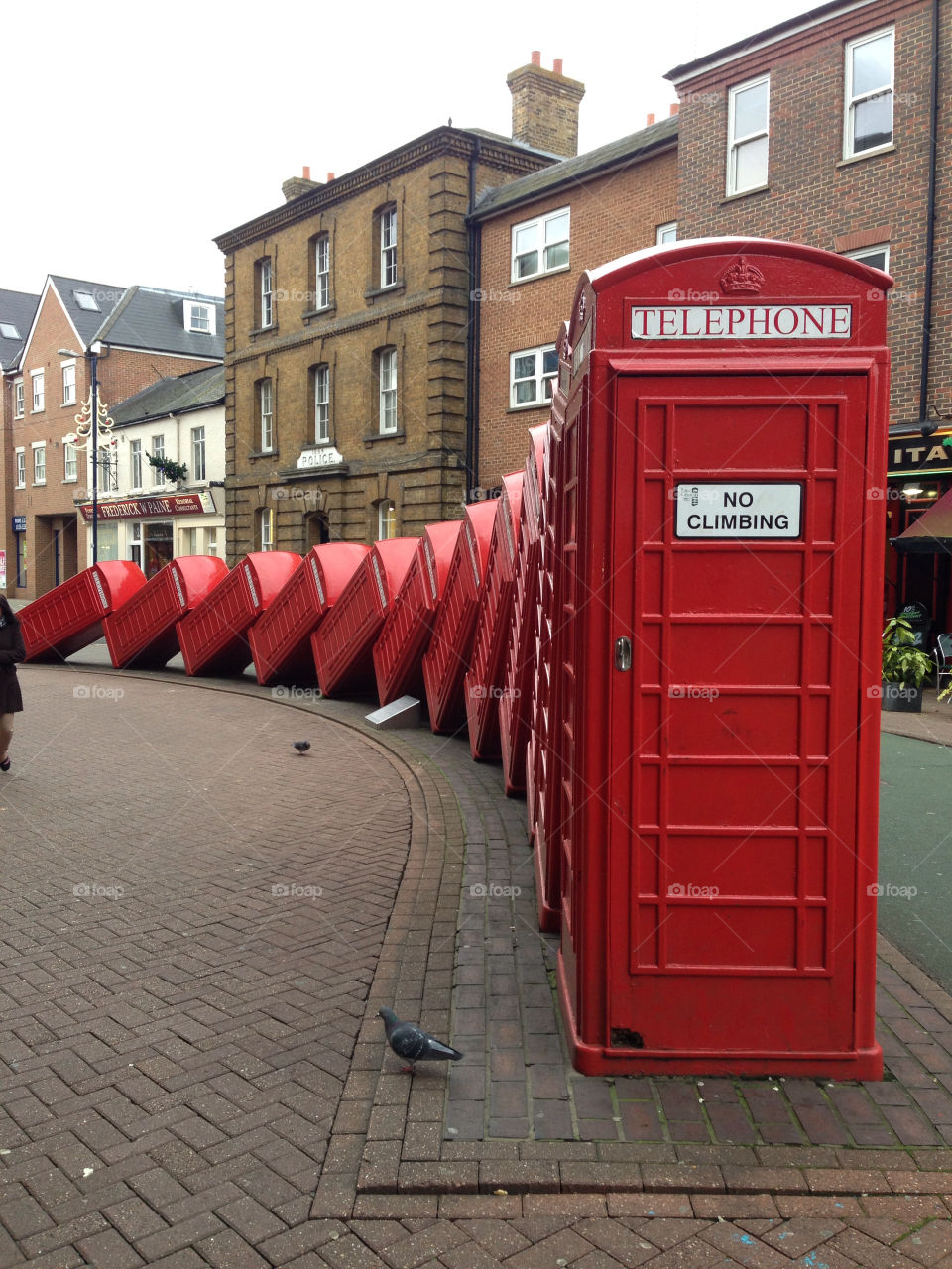 red buildings telephone falling by anglauderdale