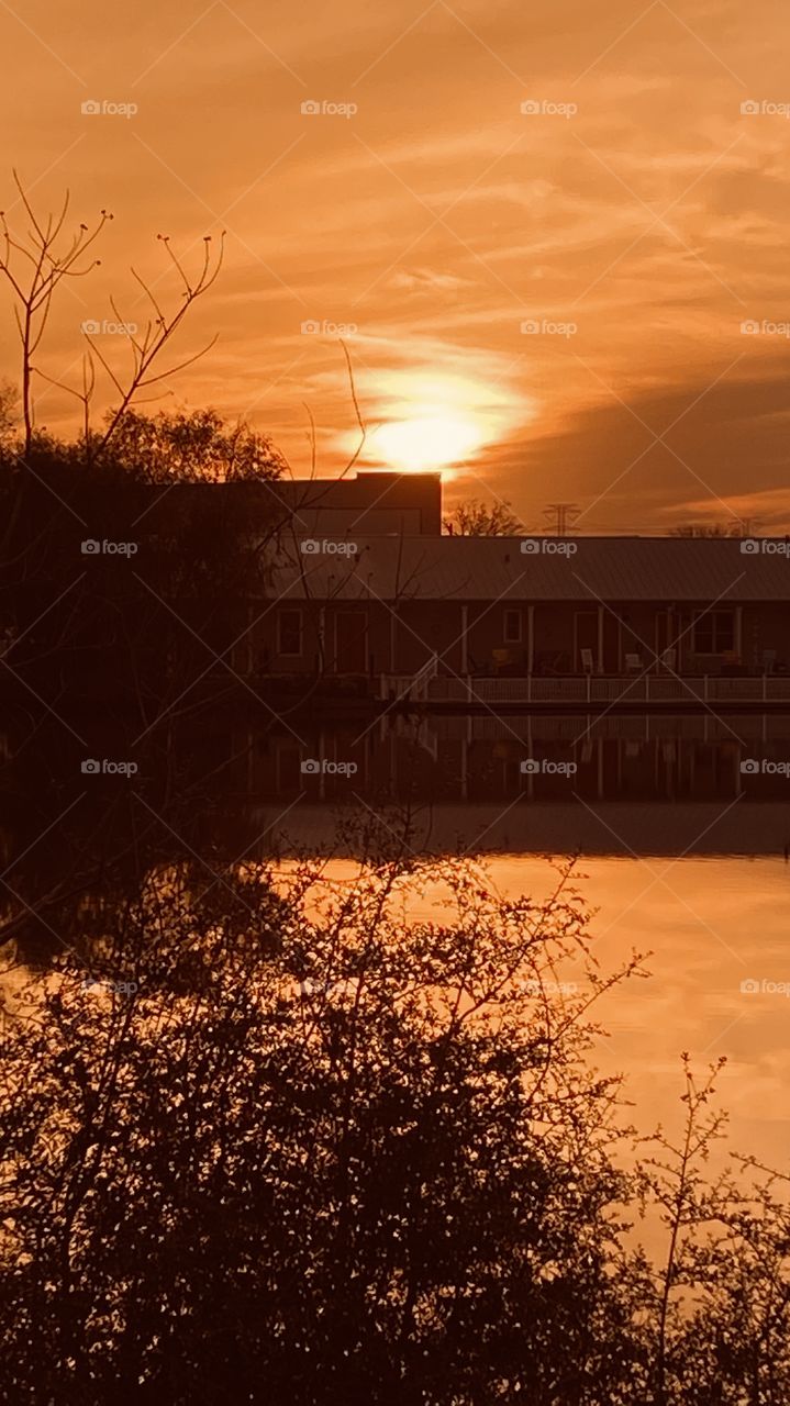 Sun is beating hole in high clouds trying cast the light and colors its represented throughout each day here. 