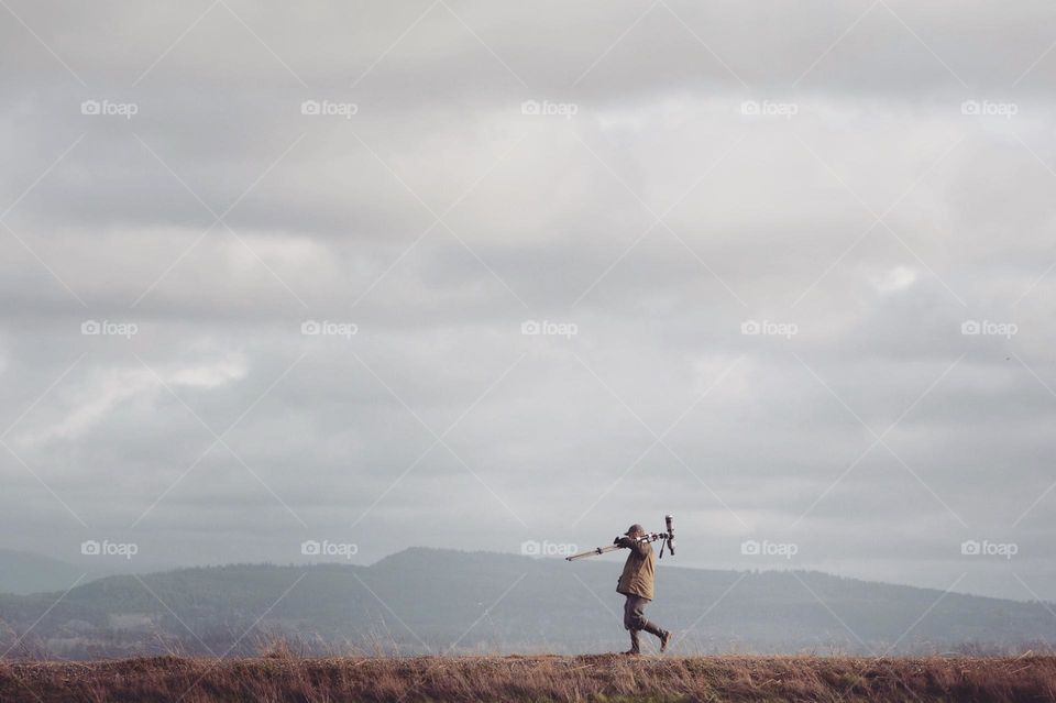 Bird watcher with spotting scope