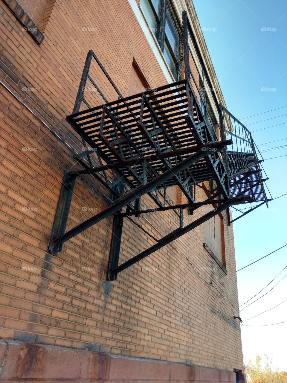 old rustic building Landing for fire escape