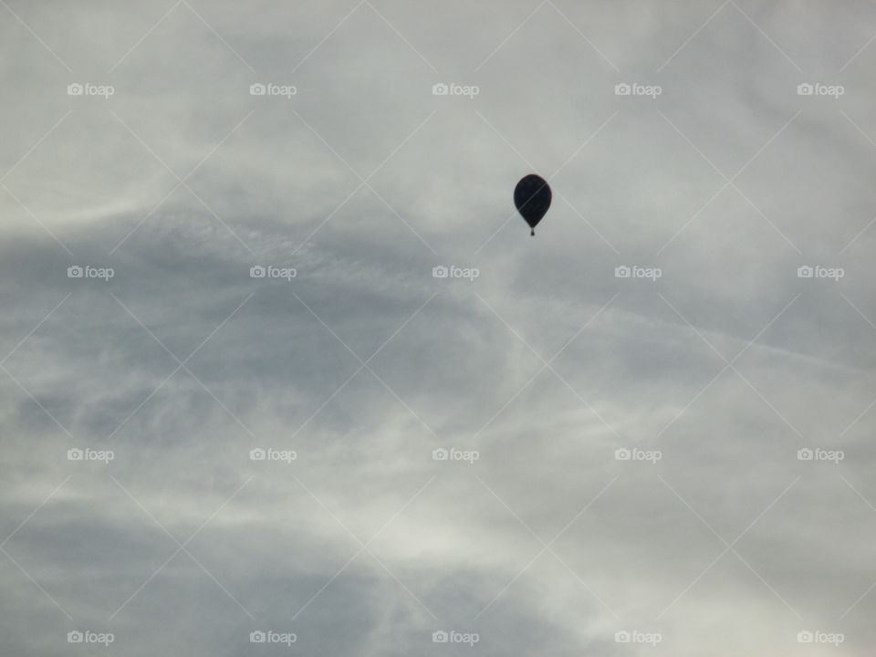Hot air balloon in the clouds 