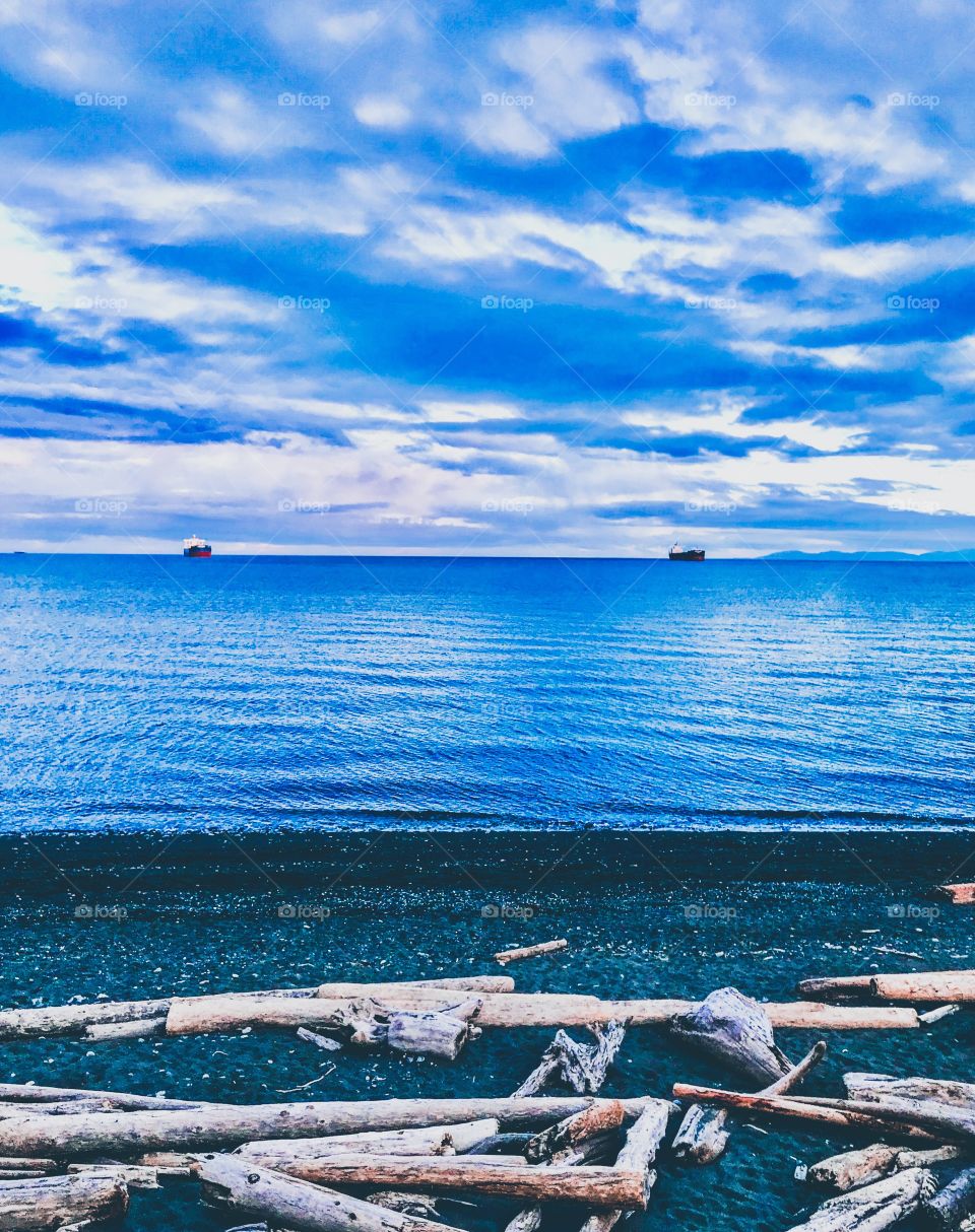 Ships afar on the bluest ocean 