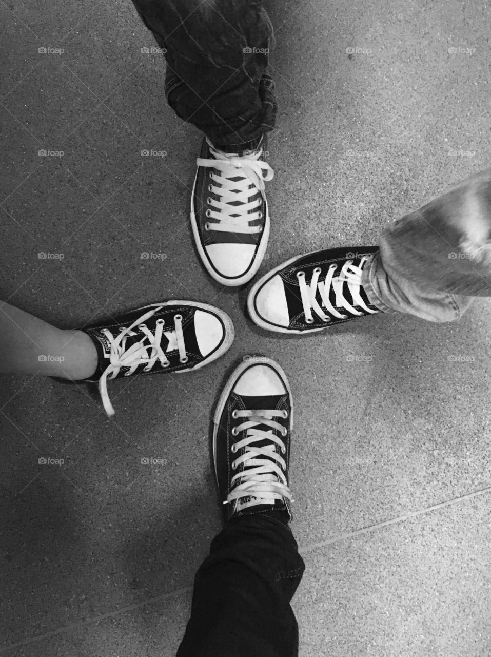 Four People Wearing Canvas Shoes