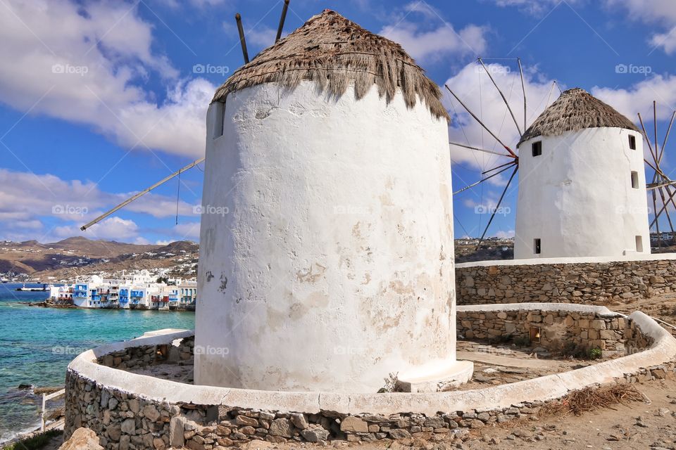 Old white mills on the Greek island of Mykonos