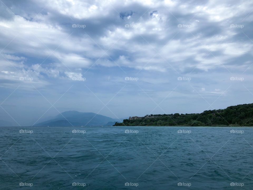 View of lake Garda near Sirmione Italy mountain 