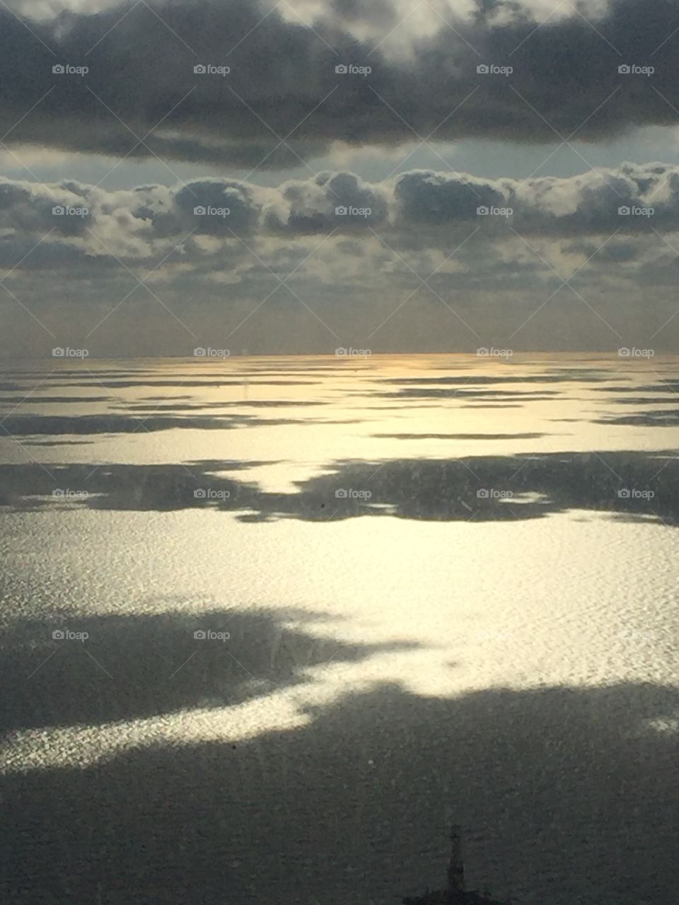 View out of a helicopter of the Gulf of Mexico flying out to an offshore platform 