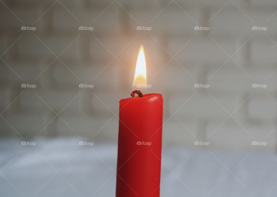 Burning red candle