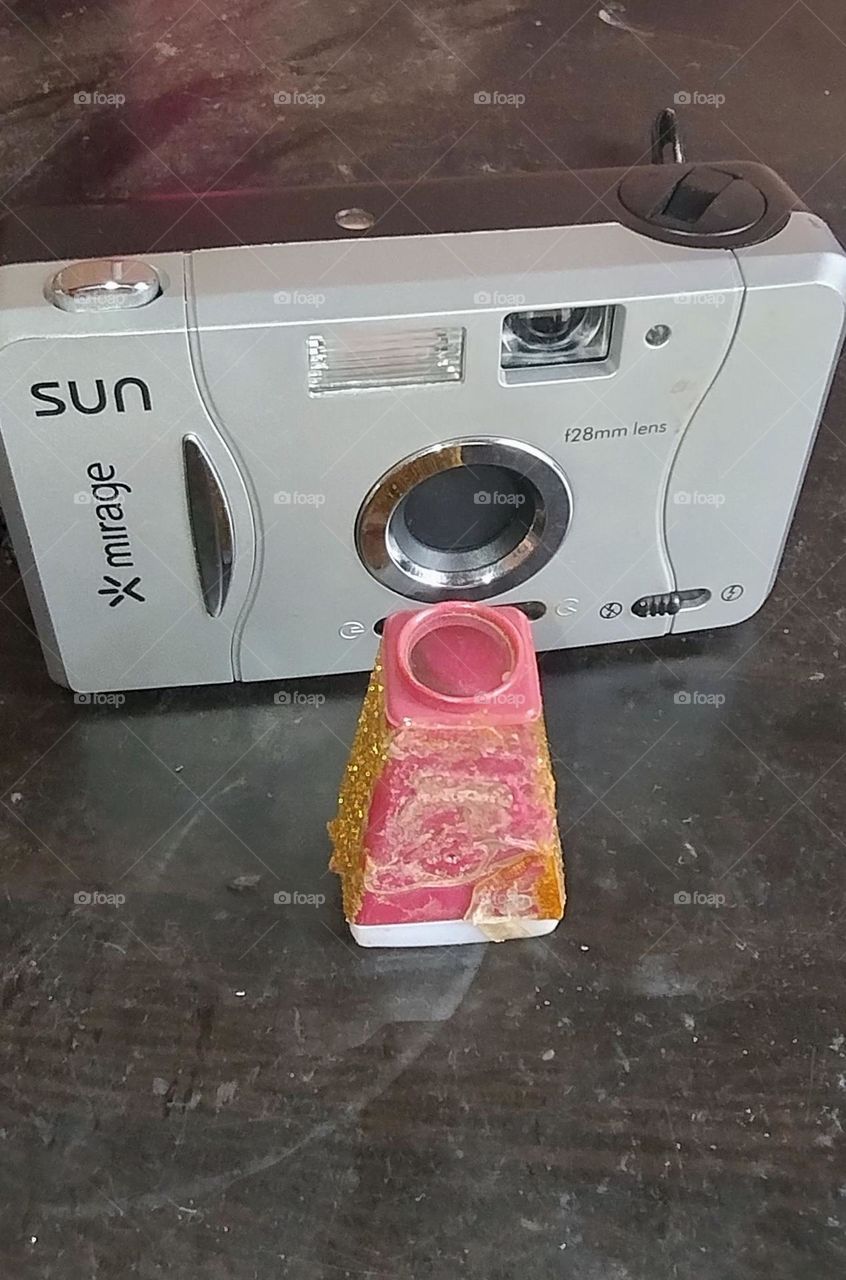 old camera and old photo in binoculars