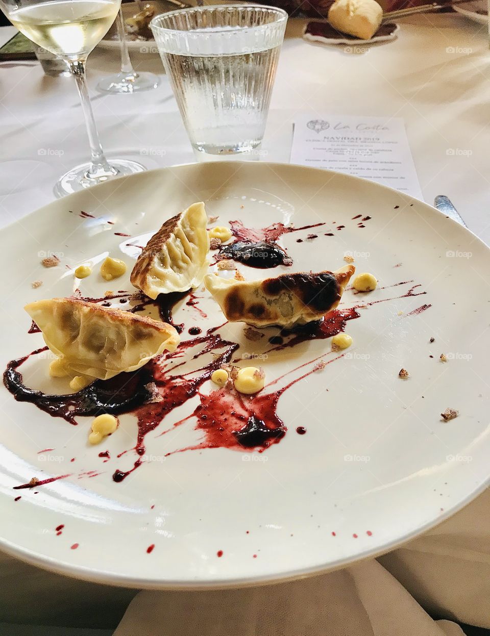 Dumplings with wild fruit sauce