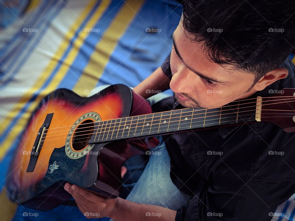 Handsome guy with guitar