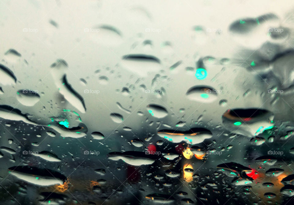 perfect rain drops on the glass of the car