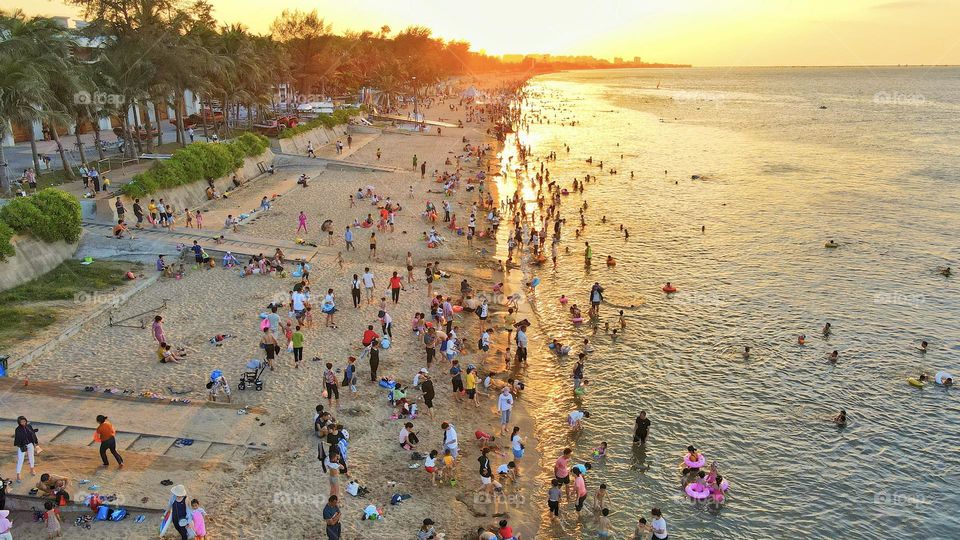 Summer Beach People enjoying sunny day at the beach 