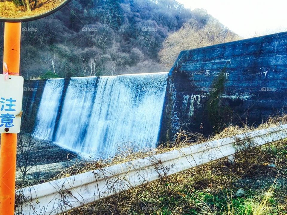 beautiful waterfall in dam amazing view