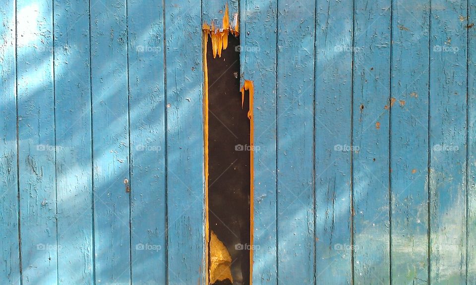 blue facade of a wooden house