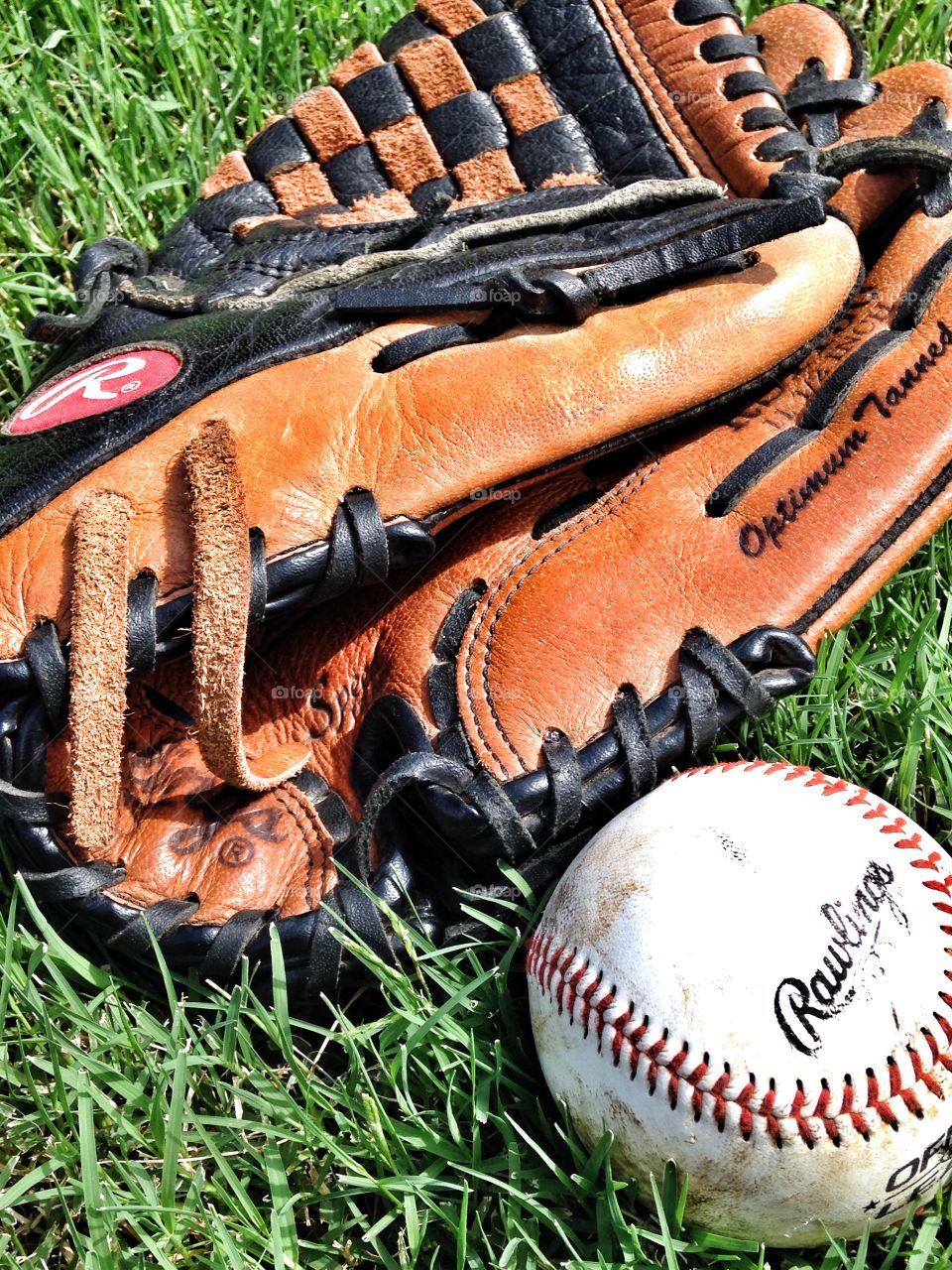 Play the game. Rawlings baseball and glove