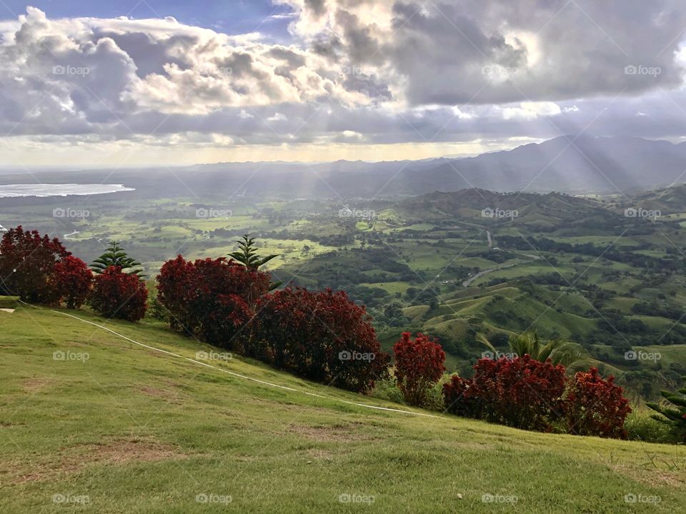 Top view of the landscape with lake and sea on the horizon