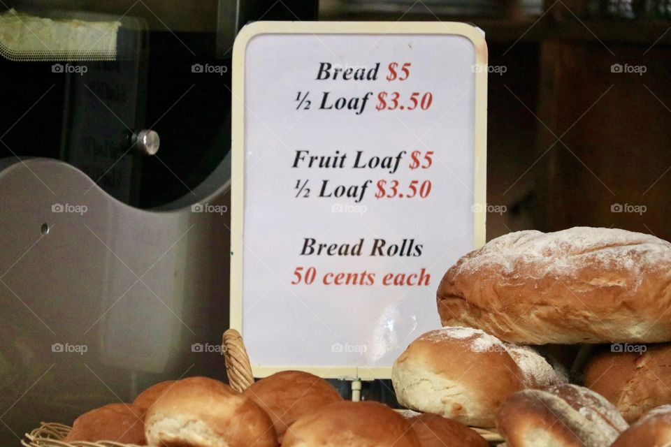 Bakery sign and bread and rolls