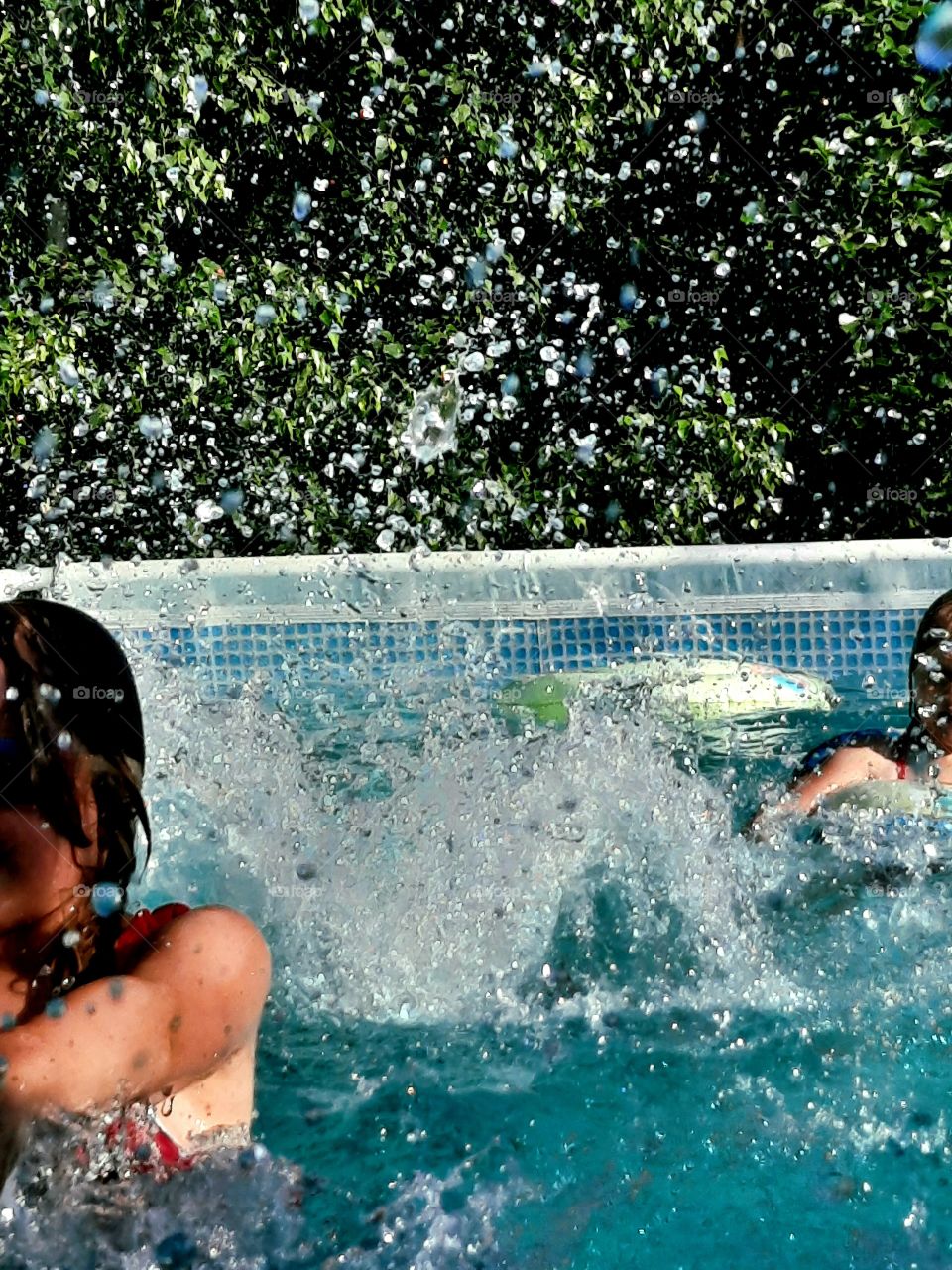 splash - children playing in the pool